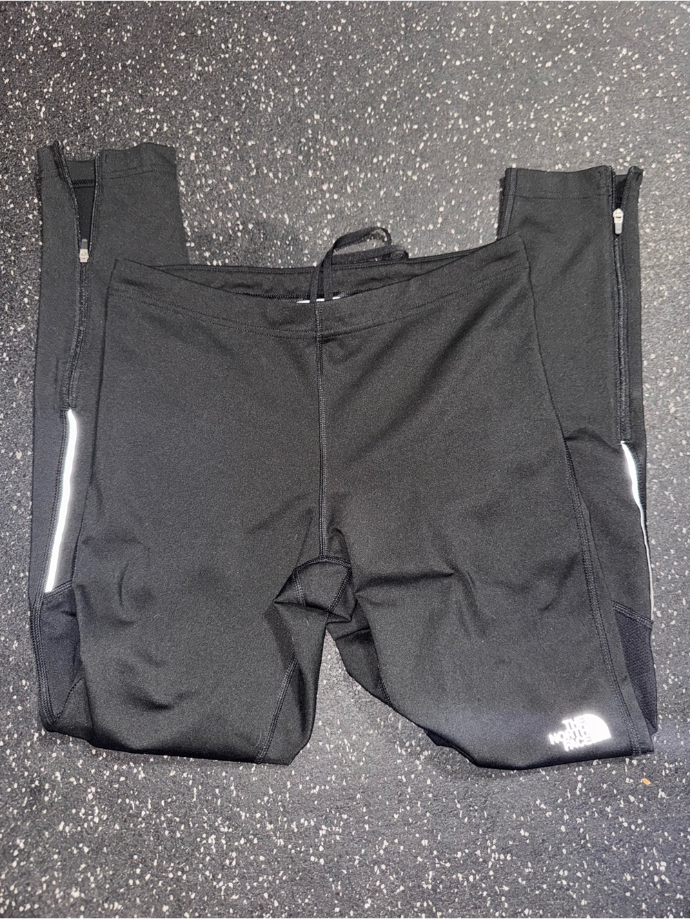 The North Face women’s  Black Performance Leggings with Reflective Accents